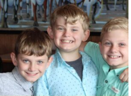 Three young brothers hoping to be adopted by the same family