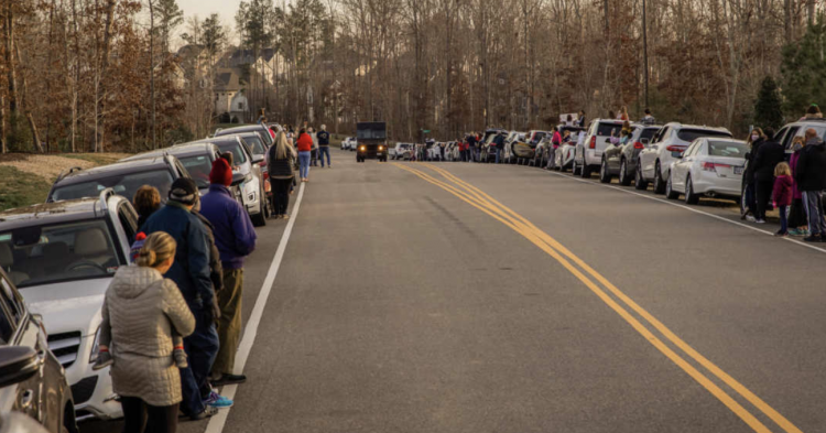 When He Realizes why The Vehicles were Lined up on The Street, an UPS Driver breaks down in Tears.