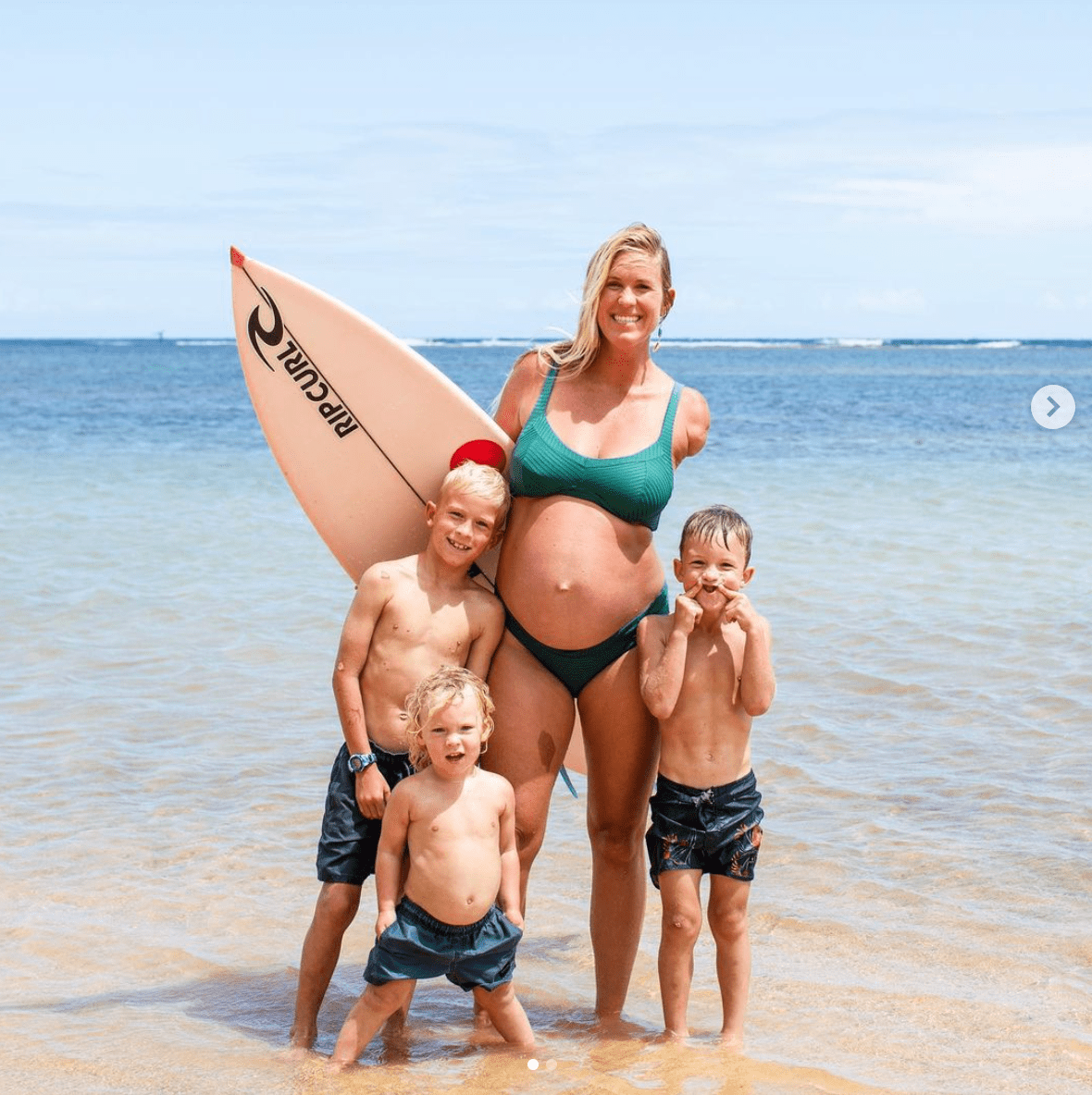 Bethany Hamilton rollerblades while pushing her son in a stroller less than three weeks before giving birth.