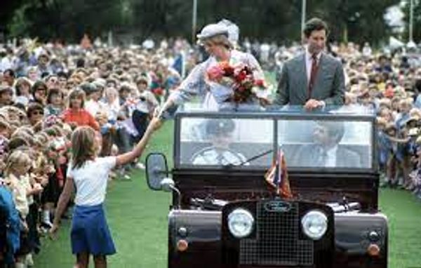 Princess Diana interacting with a follower