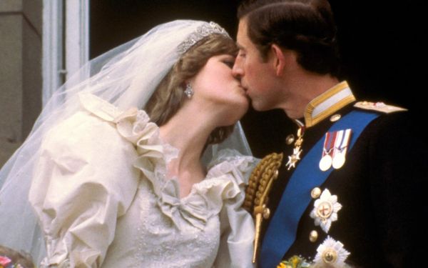 Princess Diana and Prince Charles sharing their first kiss