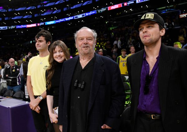 Jack Nicholson being greeted by NBA superstar LeBron James