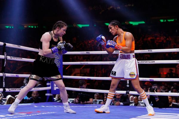 Katie Taylor of Ireland (black trunks) trades punches with Amanda Serrano of Puerto Rico (white trunks) for the World Lightweight Title fight at Madison Square Garden on April 30, 2022 in New York, New York. This bout marks the first women's boxing fight to headline Madison Square Garden in the venue's history. Taylor defeated Serrano on a judges decision. (Photo by Sarah Stier/Getty Images)