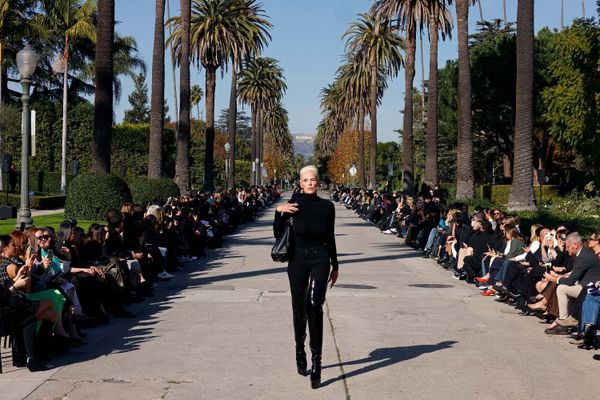 Danish model Brigitte Nielsen returned to the catwalk in a pair of thigh-high platforms with a seven-inch heel.