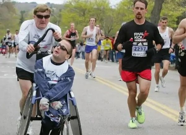 Dick and Rick Hoyt running together in the Boston Marathon