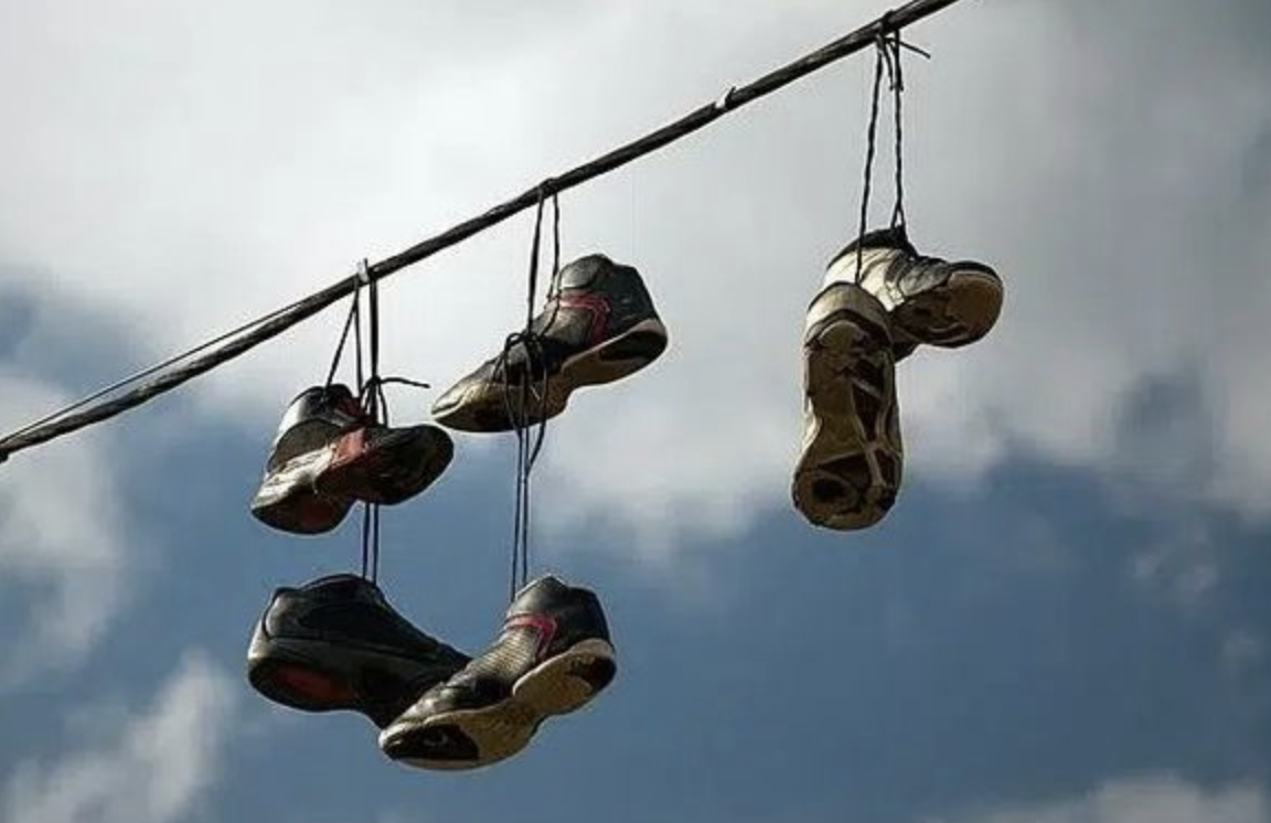 The Mystery of Sneakers on Power Lines